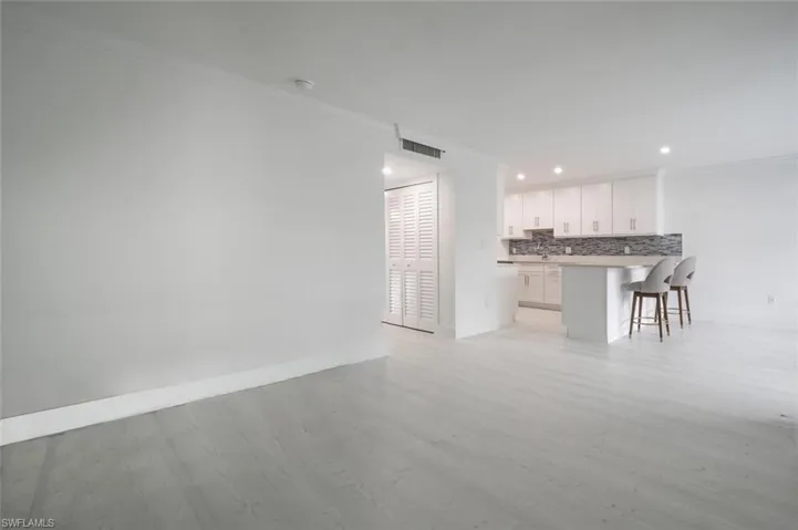 Enter great open floorplan.  Beautiful grey flooring.