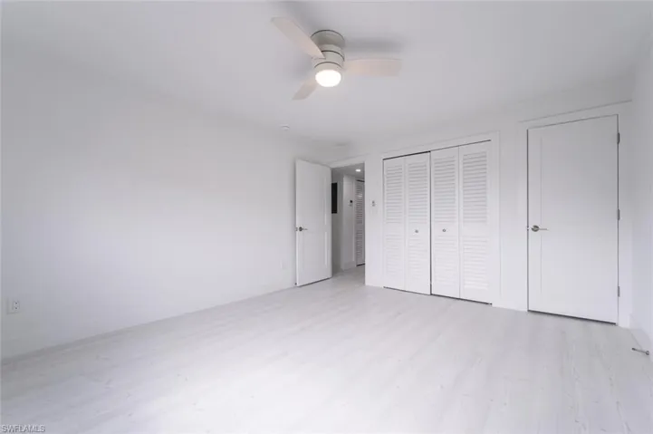 Washer/dryer hookups behind doors to left-door to right to walkin closet