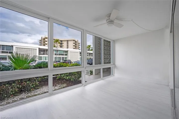Lots of tall sliding windows and screens, plus interior sliding doors to further interior.