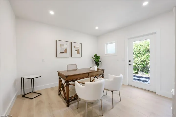 Office featuring light wood-style floors, recessed lighting, and baseboards
