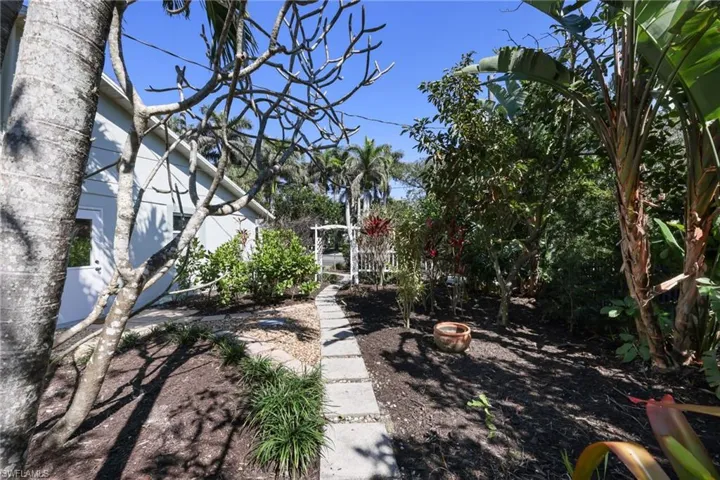 View of yard featuring an outdoor fire pit
