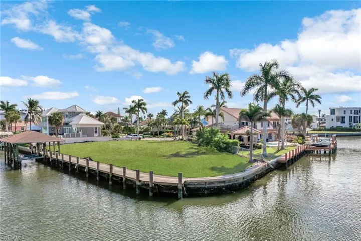Rare boat house and room for additional dockfor entertaining or additional vessels