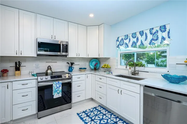 All new white and stainless steel kitchen!