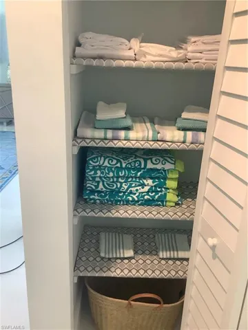 Master linen closet with custom matched towels!