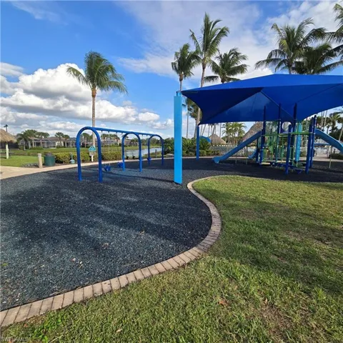 Community play area with a lawn