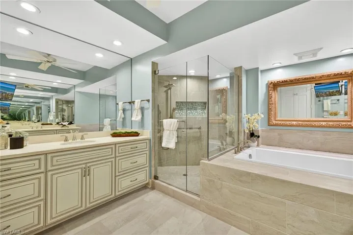 Luxurious Primary Bathroom with Double Vanities & Separate Shower & Bath