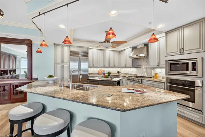 Stainless Steel Appliances with 6-Burner Gas Cooktop & Subzero Style Refrigeration