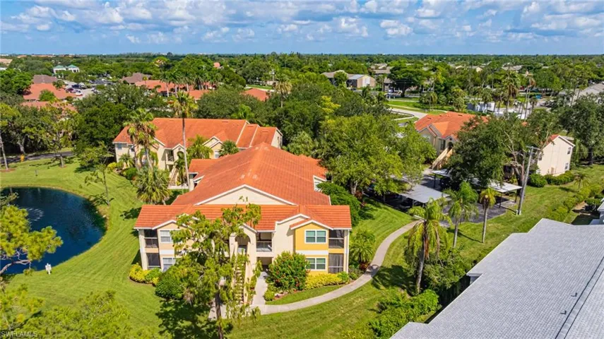 Aerial view of residential area with a large body of water