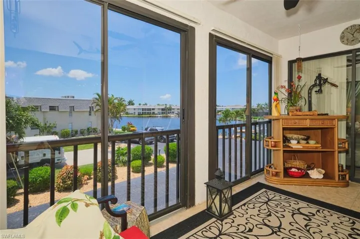Sun room or lanai.  Pretty place to relax and watch the boats go by.