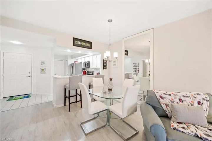 Dining area featuring light wood finished floors and baseboards