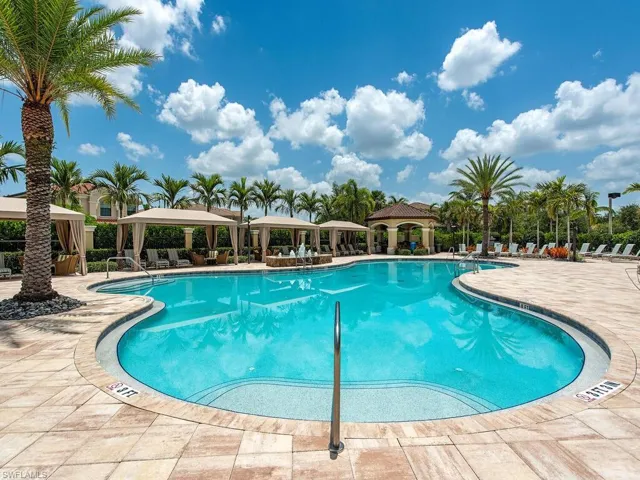 Community pool with a gazebo and a patio area