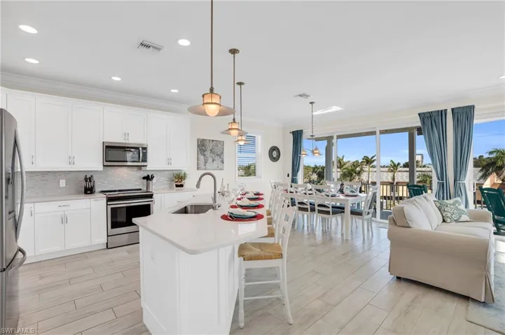 Open concept living, kitchen and dining