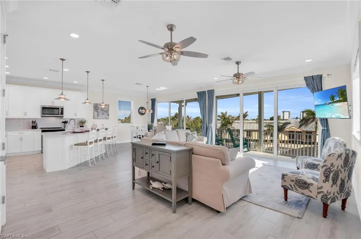Open concept living, kitchen and dining