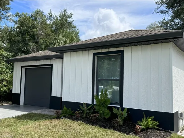 View of home's exterior featuring a garage