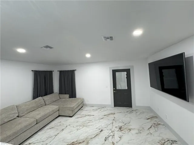 View of tiled living room