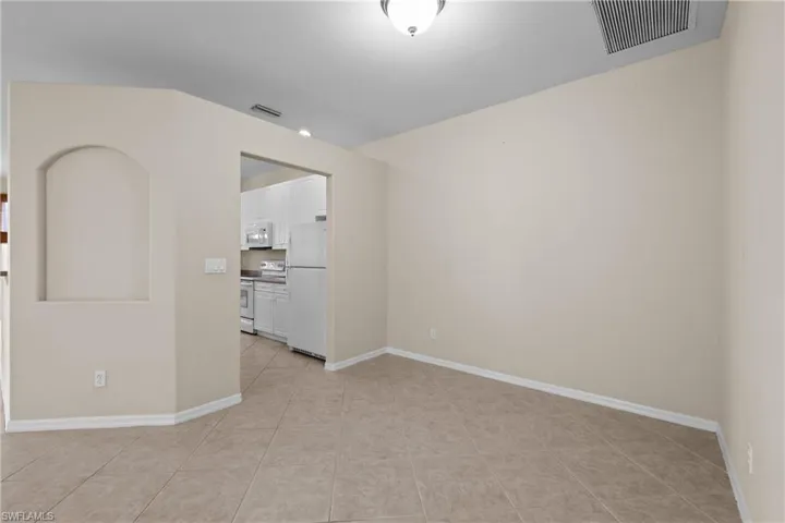 Dining Room featuring baseboards and light tile patterned floors