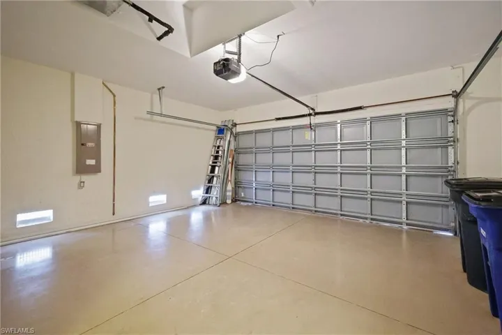 Garage with electric garage door opener