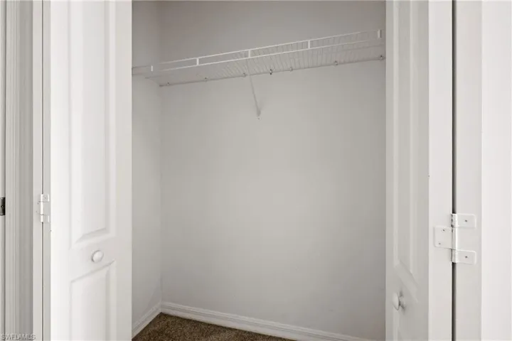 View of primary bedroom's 2nd closet