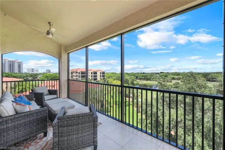 Large lanai overlooking Club Pelican Bay golf course  You can see four golf holes from this lanai!