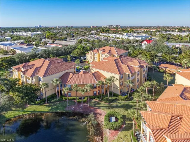 Community clubhouse with fitness room, pool, hot tub