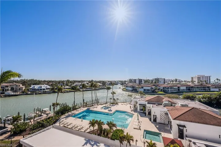 View of pool as ell as the waterways intersecting!  A very special location in the Naples area.