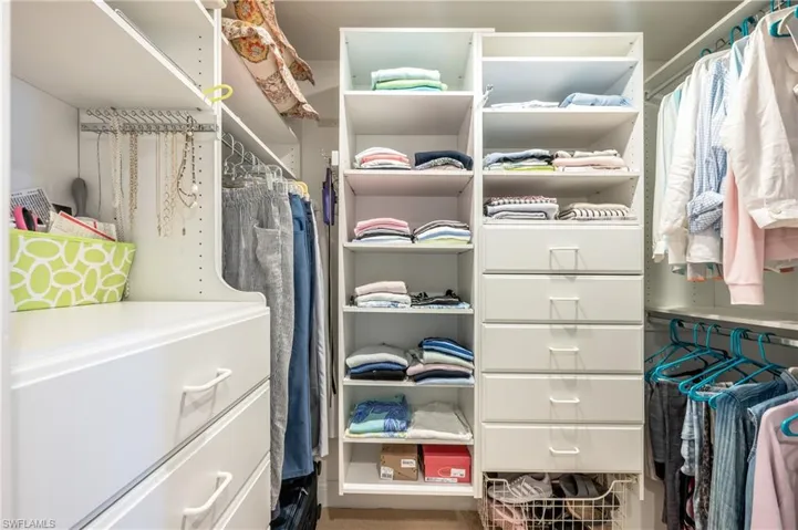 This is one of two walk in closets with dresser built-ins and shelves to fill!