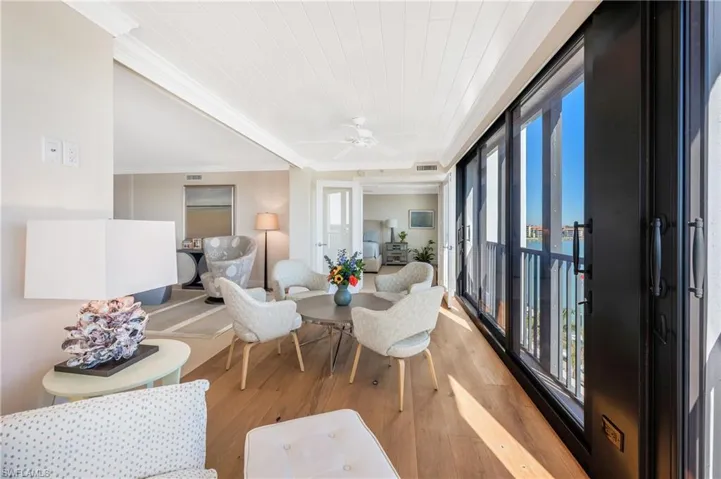A great spot to read a book or enjoy your morning coffee watching the sunrise over the bay.  The French doors lead into the master suite.