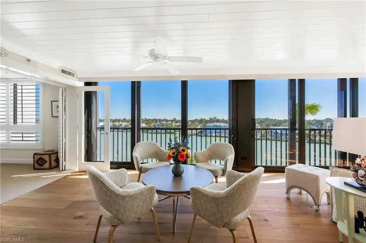 Relax and enjoy the view with dolphins at play and boats cruising by!