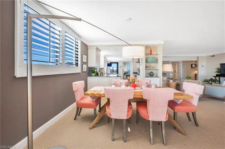 The close proximity to the kitchen allows the "chef" to be involved in all the conversation!