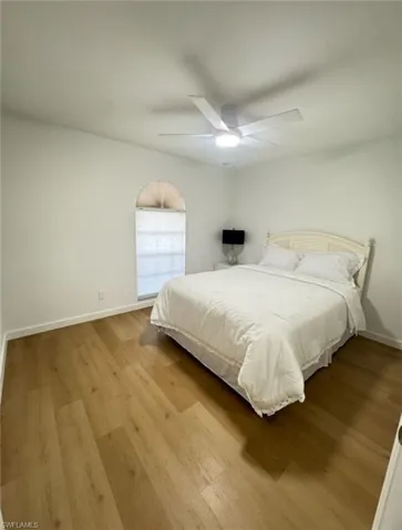 Bedroom featuring light wood finished floors and ceiling fan