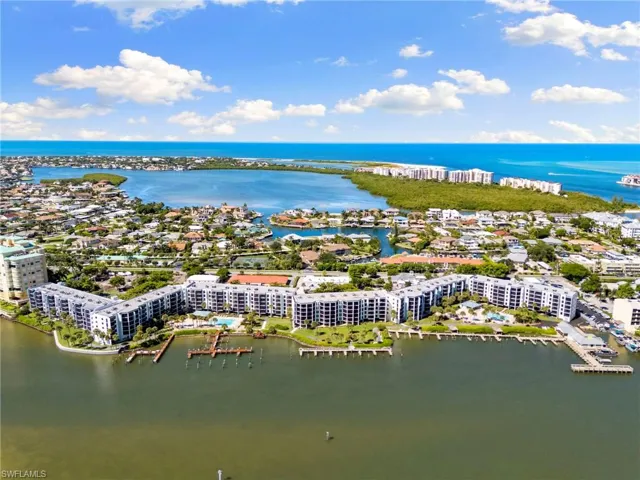 View of urban area featuring a nearby body of water