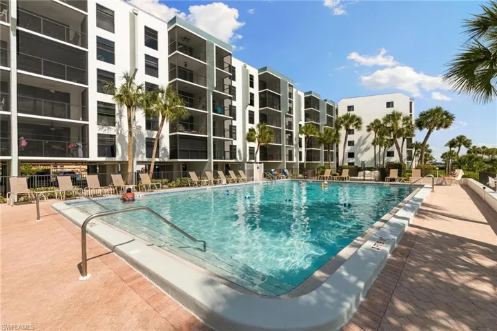 Community pool featuring a patio area