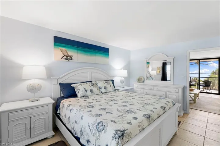 Bedroom with light tile patterned floors