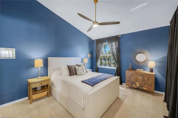 Master Bedroom with Vaulted ceiling with ceiling fan