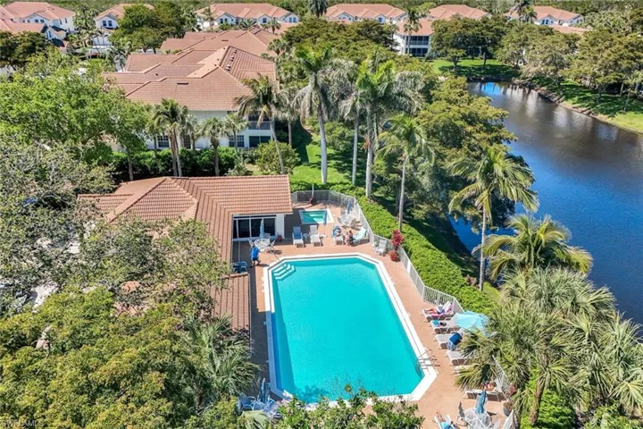 Community pool with a patio area