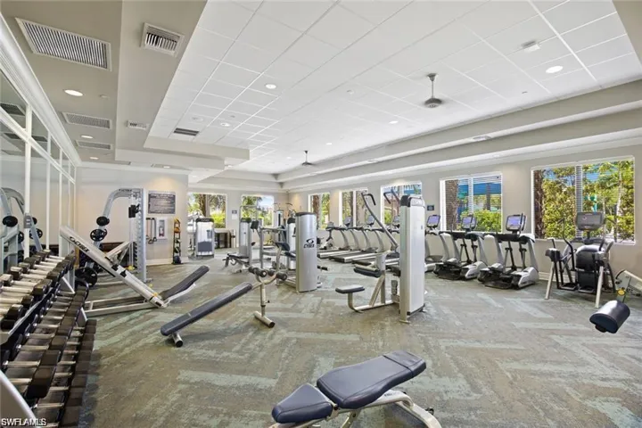 Gym with a paneled ceiling