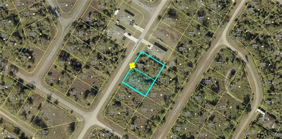 Aerial overview of property's location with property parcel outlined