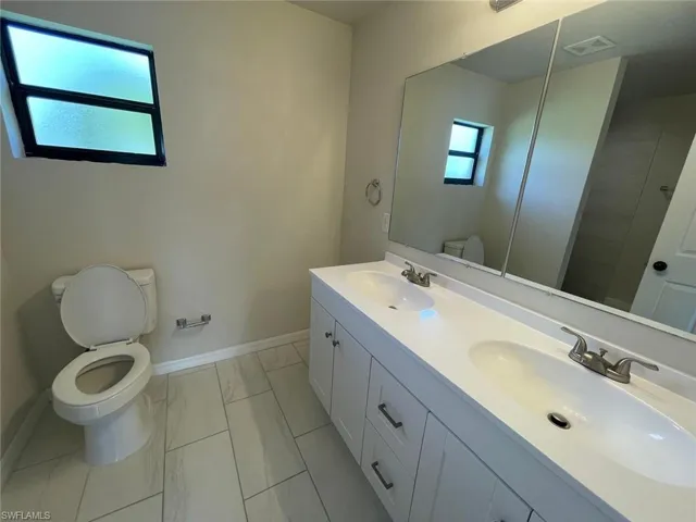 Primary w/ Double Sinks and Shower