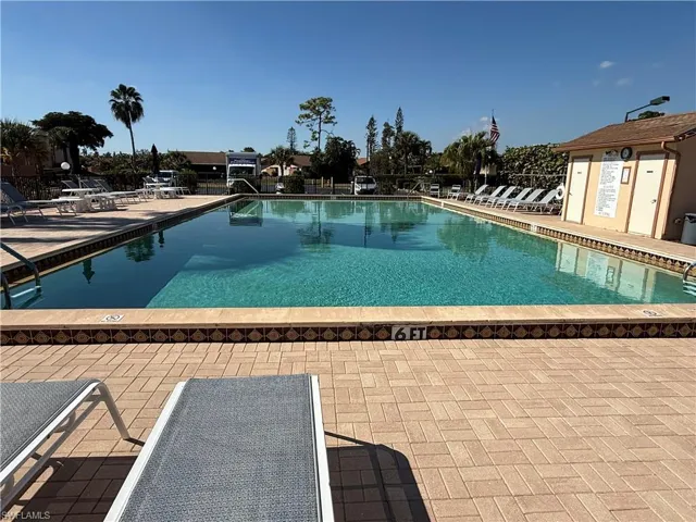 Community pool with a patio area