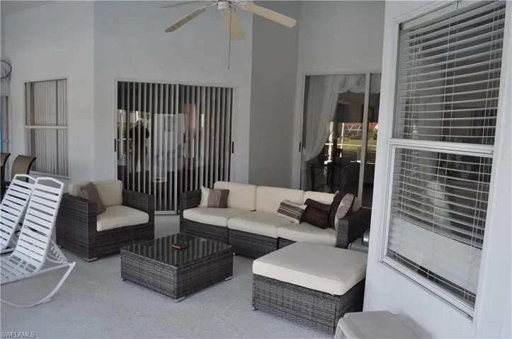 View of patio / terrace featuring an outdoor living space and a ceiling fan