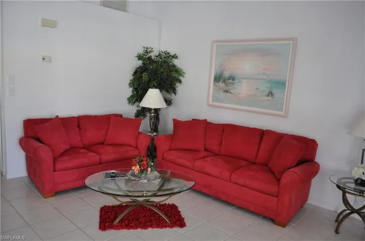 Tiled living area with baseboards