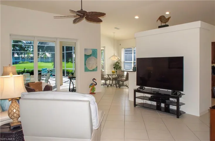 View to lanai, breakfast nook, and kitchen behind the wall