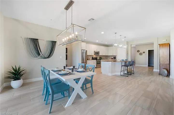 Tiled dining space with room for entire family