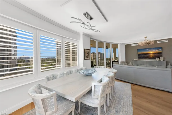 Dining area flows from kitchen to living area to lanai- perfect for effortless entertaining!
