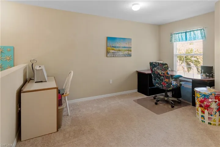 Loft area is perfect for a home office!