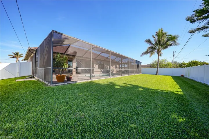 View of yard with a lanai and a patio area
