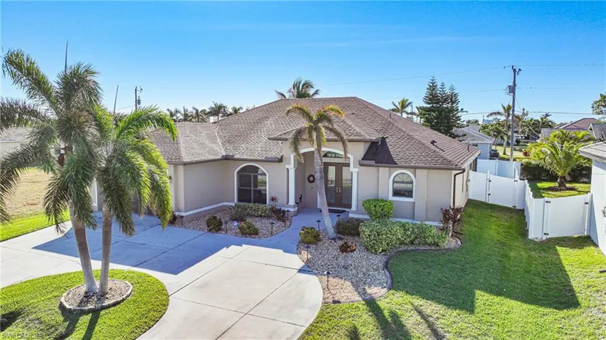 View of front of property with a front lawn