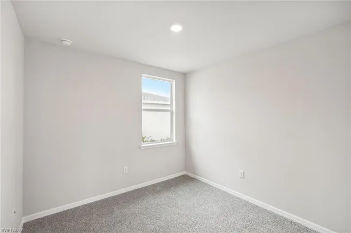 Empty room featuring carpet