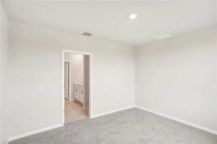View of carpeted spare room