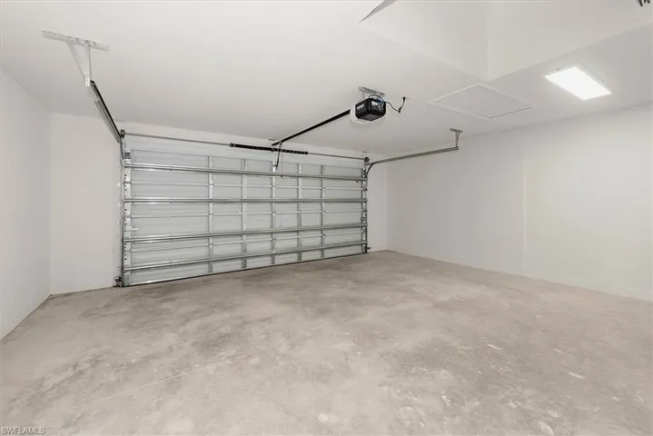 Garage has a smart opener and is wider than most standard garages giving you more space to get out of your car or more room for storage.